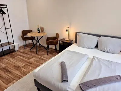 Ein Bett oder Betten in einem Zimmer der Unterkunft Süße Marie 15