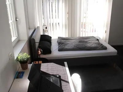 Ein Bett oder Betten in einem Zimmer der Unterkunft Ferienwohnung Rimbach im Odenwald