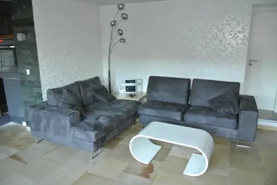 Ein Sitzbereich in der Unterkunft Ferienwohnung Lotti Südpfalz