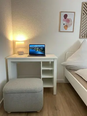 Ein Bett oder Betten in einem Zimmer der Unterkunft Stylische Designwohnung direkt am Schloss Bruchsal mit 80 m2