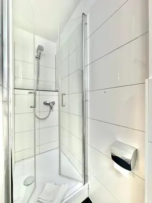 Ein Badezimmer in der Unterkunft AR Boutique Hotel Heusenstamm