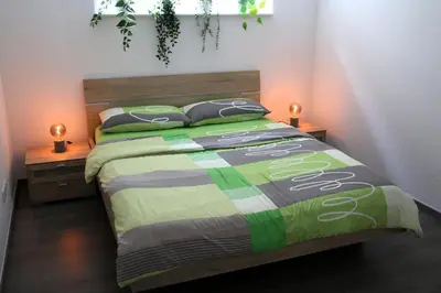 Ein Bett oder Betten in einem Zimmer der Unterkunft Ruheoase im kleinen Odenwald