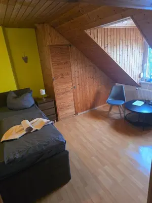 Ein Sitzbereich in der Unterkunft Landgasthof Hotel Rebe Alzey