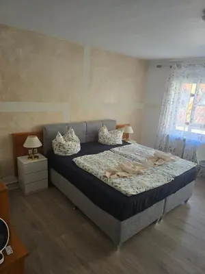Ein Bett oder Betten in einem Zimmer der Unterkunft Landgasthof Hotel Rebe Alzey