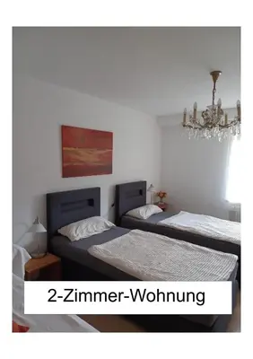 Ein Bett oder Betten in einem Zimmer der Unterkunft Ferienwohnung Kugel