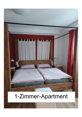 Ein Bett oder Betten in einem Zimmer der Unterkunft Ferienwohnung Kugel