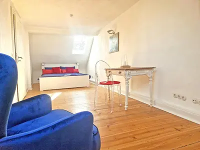Ein Bett oder Betten in einem Zimmer der Unterkunft 64 qm Harmonic Design mit Küche, ruhige und begrünte Lage , Innenstadt Ost