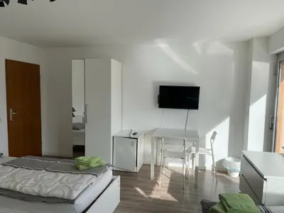 TV/Unterhaltungsangebot in der Unterkunft Boardinghouse Behrend III