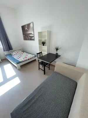 Ein Bett oder Betten in einem Zimmer der Unterkunft Central old building room