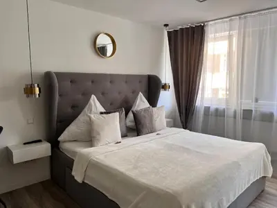 Ein Bett oder Betten in einem Zimmer der Unterkunft Sophie Flair Apartments 2