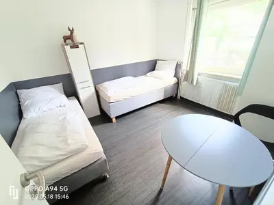 Ein Bett oder Betten in einem Zimmer der Unterkunft Apartment,Haus 21