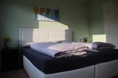 Ein Bett oder Betten in einem Zimmer der Unterkunft Felsenblick