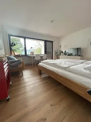 Ein Bett oder Betten in einem Zimmer der Unterkunft Glücks-Quartier Kaffeehof 4