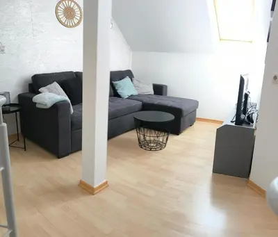 Ein Sitzbereich in der Unterkunft Alexandras Ferienwohnung - Maisonette 90 qm mit Balkon