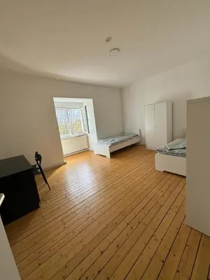 Ein Bett oder Betten in einem Zimmer der Unterkunft Monteurwohnung Neustadt Zentrum