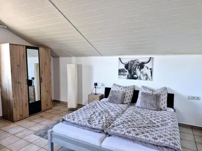 Ein Bett oder Betten in einem Zimmer der Unterkunft Auszeit und Idylle auf dem Pferdehof