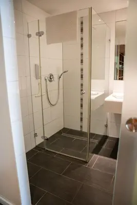 Ein Badezimmer in der Unterkunft Hotel am Schlosspark