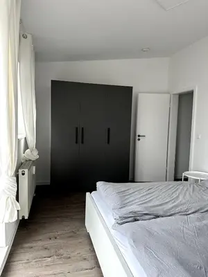 Ein Bett oder Betten in einem Zimmer der Unterkunft großzügige Wohnung in Sinsheim