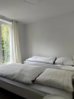 Ein Bett oder Betten in einem Zimmer der Unterkunft großzügige Wohnung in Sinsheim