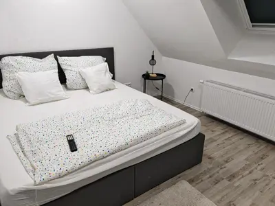 Ein Bett oder Betten in einem Zimmer der Unterkunft Yann Wohlfühl & schönes Apartment