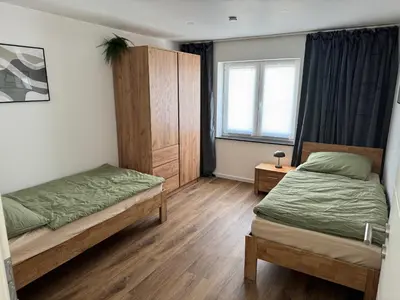 Ein Bett oder Betten in einem Zimmer der Unterkunft Melem Apartments 1