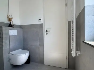 Ein Badezimmer in der Unterkunft Melem Apartments 1
