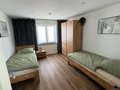 Ein Bett oder Betten in einem Zimmer der Unterkunft Melem Apartments 1