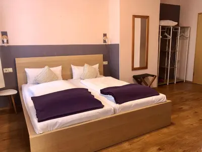Ein Bett oder Betten in einem Zimmer der Unterkunft Ludwigs