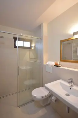 Ein Badezimmer in der Unterkunft Hotel am Kirchplatz
