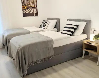 Ein Bett oder Betten in einem Zimmer der Unterkunft neu renovierte, gemütliche 4 Zi