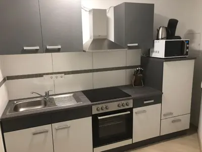 Küche/Küchenzeile in der Unterkunft LIV Design Apartments Karlsruhe Weststadt