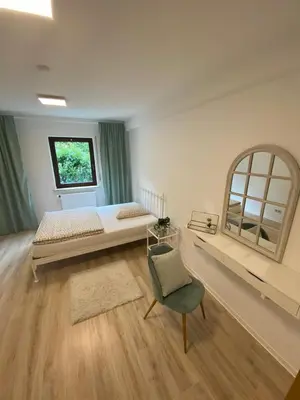 Ein Bett oder Betten in einem Zimmer der Unterkunft Waldzeit XL Apartment Natur und Self Check-in