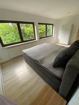 Ein Bett oder Betten in einem Zimmer der Unterkunft Waldzeit XL Apartment Natur und Self Check-in
