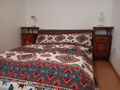 Ein Bett oder Betten in einem Zimmer der Unterkunft Kinderfreundliche Wohnung