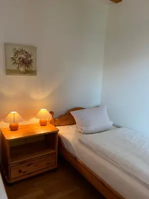 Ein Bett oder Betten in einem Zimmer der Unterkunft Ferienhaus Bohnert