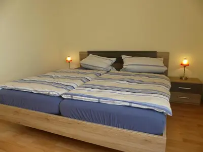 Ein Bett oder Betten in einem Zimmer der Unterkunft Ferienwohnung Schanbacher
