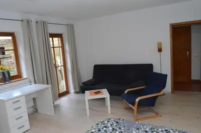Ein Sitzbereich in der Unterkunft Apartment Albert