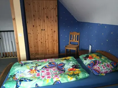 Ein Bett oder Betten in einem Zimmer der Unterkunft Ferienhaus Walther