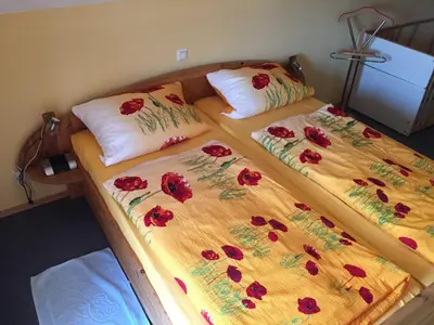 Ein Bett oder Betten in einem Zimmer der Unterkunft Ferienhaus Walther