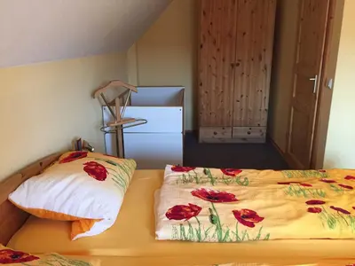 Ein Bett oder Betten in einem Zimmer der Unterkunft Ferienhaus Walther