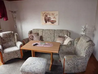 Ein Sitzbereich in der Unterkunft Ferienwohnung Kraemer in Erbach