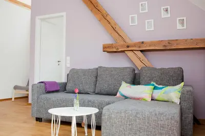 Ein Sitzbereich in der Unterkunft Ferienwohnungen Elsbacher Hof