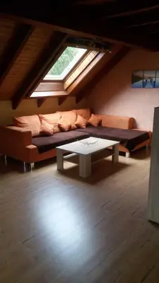 Ein Sitzbereich in der Unterkunft Ferienwohnung Kuhn