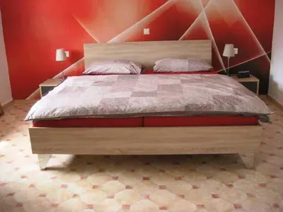 Ein Bett oder Betten in einem Zimmer der Unterkunft Klaschter Gastewohnung