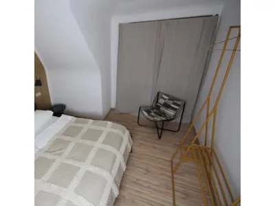 Ein Bett oder Betten in einem Zimmer der Unterkunft Ferienwohnung Waldblick
