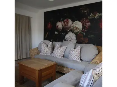 Ein Sitzbereich in der Unterkunft Ferienwohnung Waldblick