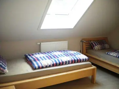 Ein Bett oder Betten in einem Zimmer der Unterkunft Ferienhof Knoll