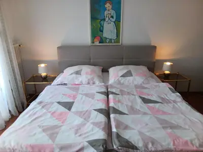 Ein Bett oder Betten in einem Zimmer der Unterkunft Ferienwohnung Sylvia