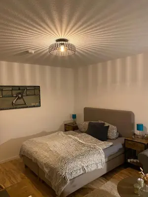 Ein Bett oder Betten in einem Zimmer der Unterkunft Kuschelnest Michelstadt