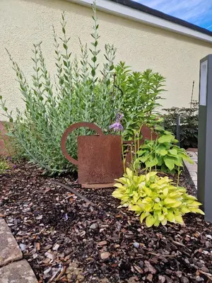 Ein Garten an der Unterkunft Ferienwohnung am Eck